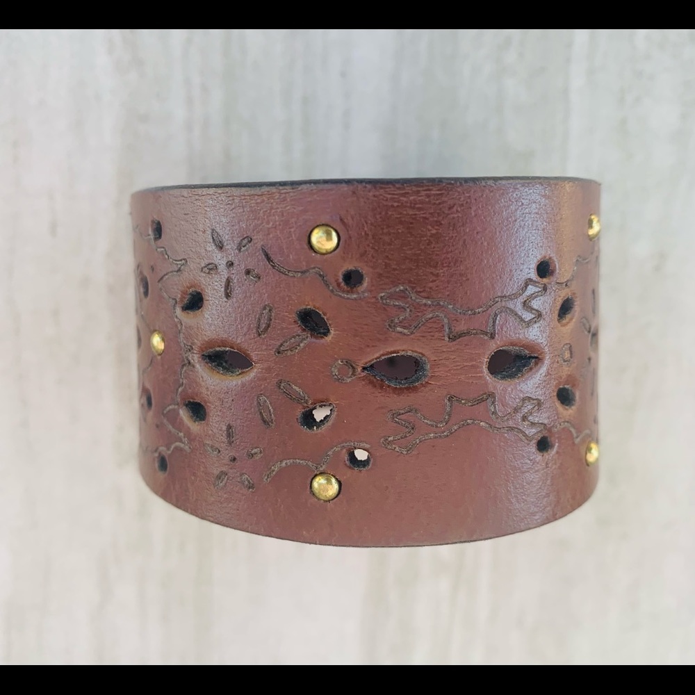 Recycled brown belt cuff.